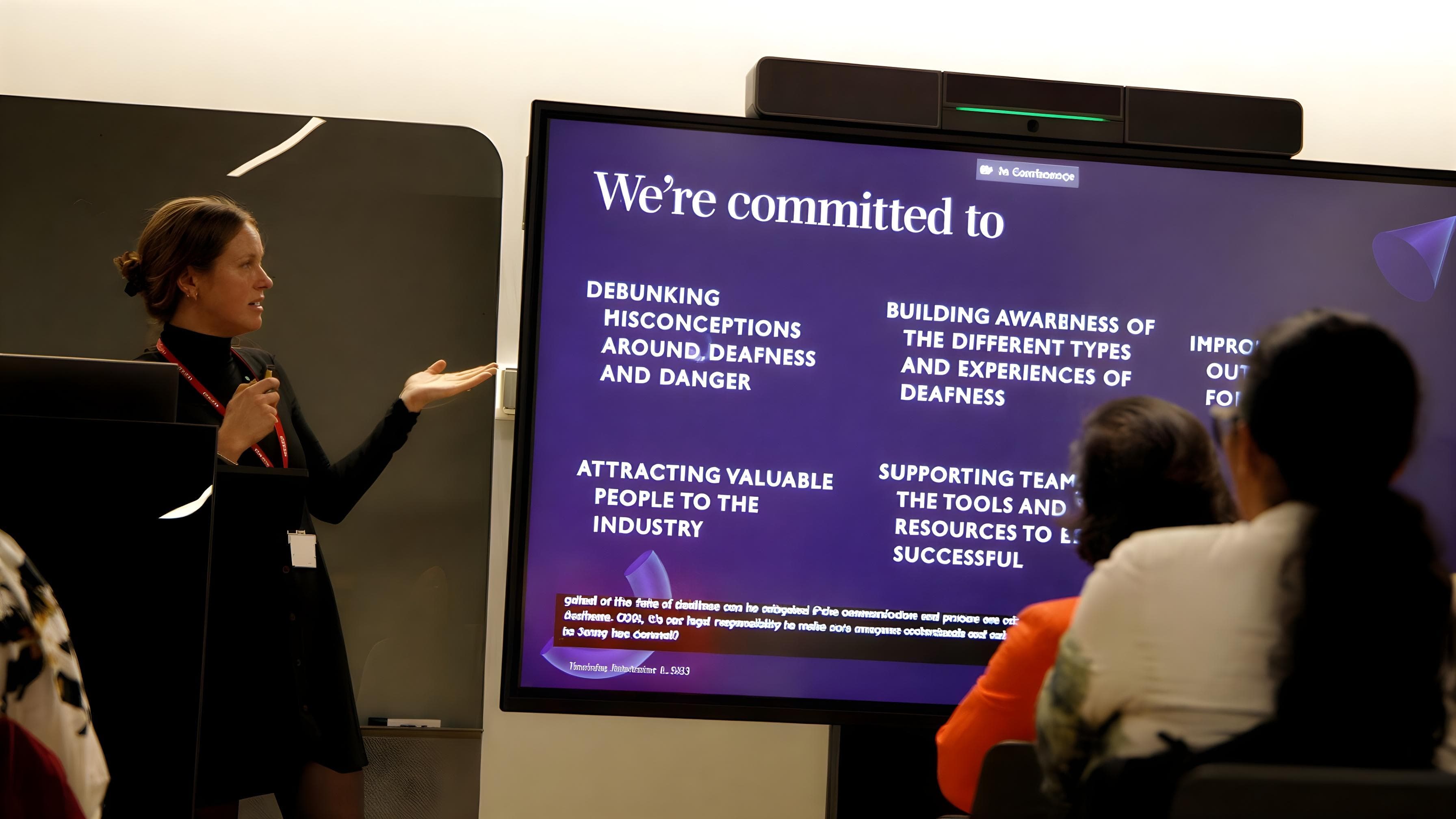 Ella Bowman from Safety in Design detailing the aims of the 'Connect to Change' d/Deaf pilot.